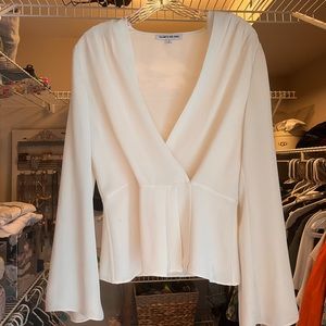 Small Cream Colored Elizabeth and James Peplum Top